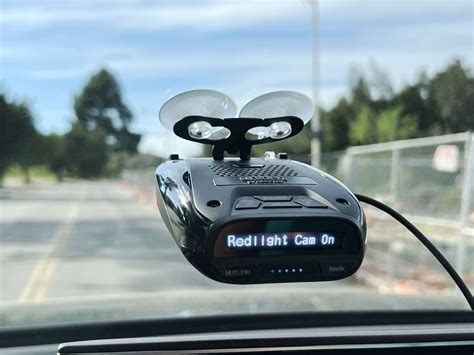 Is it illegal to have a radar detector in your car, and can it also predict the weather?