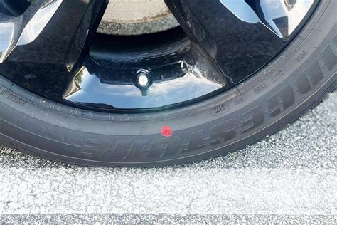 What Does the Red and Yellow Dot Mean on a Tire, and Why Do They Make Me Think of Traffic Lights?